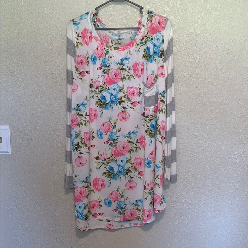 Floral dress with stripped sleeves.